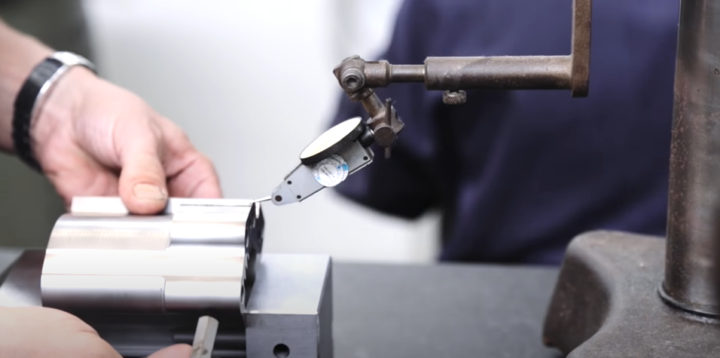 Hand operating a CNC mill