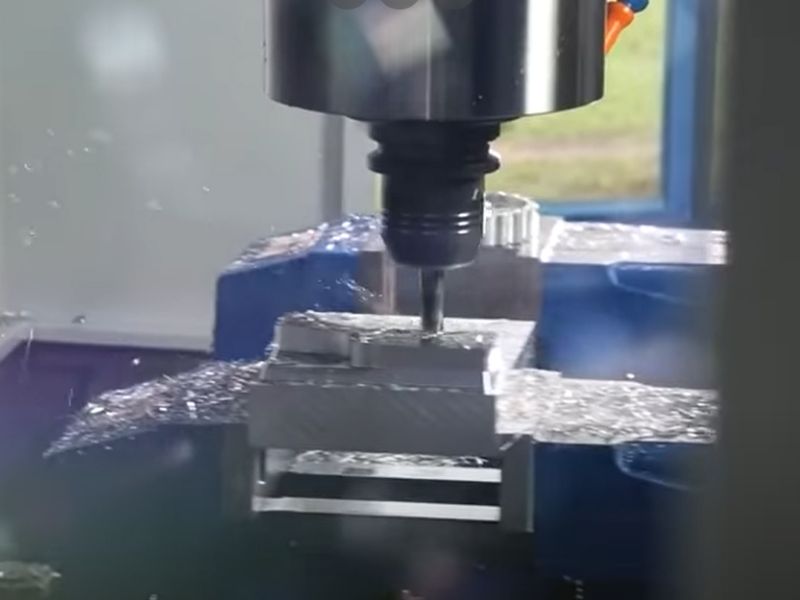 Close-up image of a three-axis CNC machine