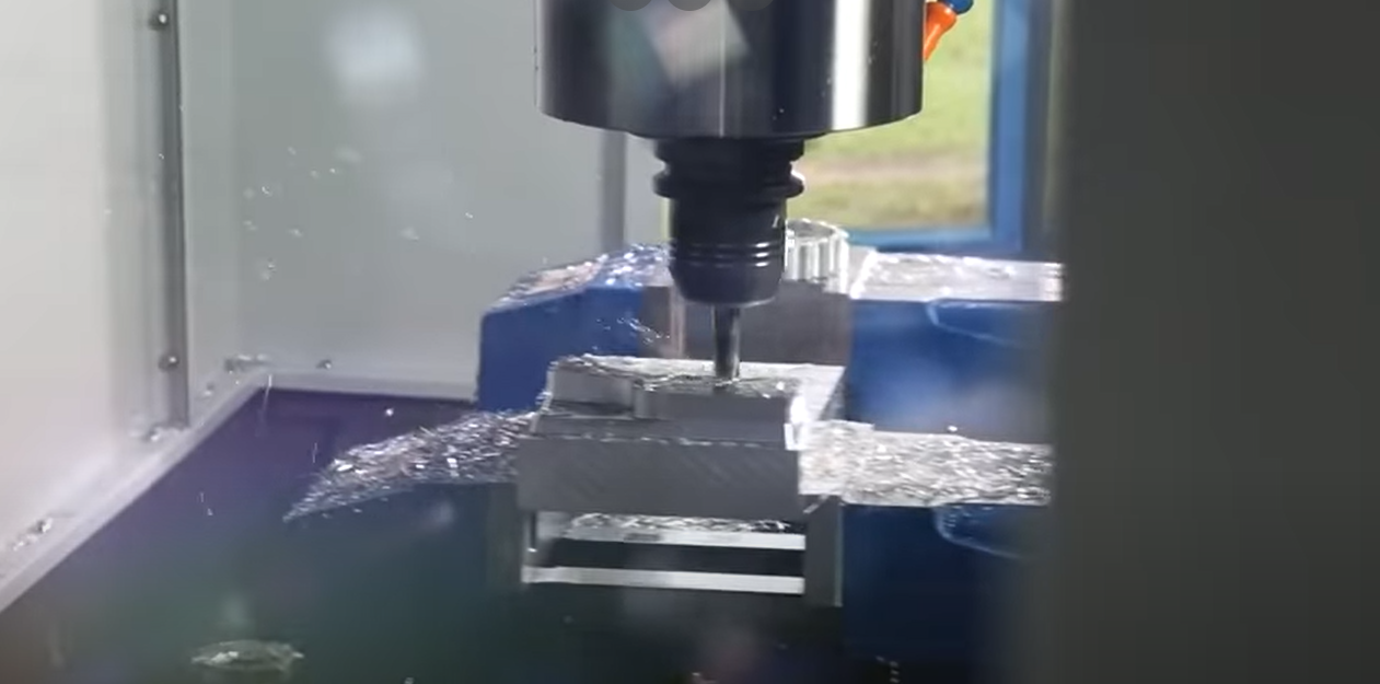 Close-up image of a three-axis CNC machine